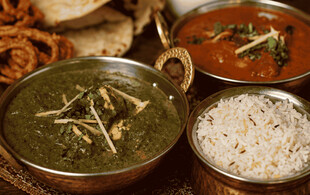 Curry Dinner for Two People incl. Two Curries, Shared Rice, One Naan & One Onion Bhaji